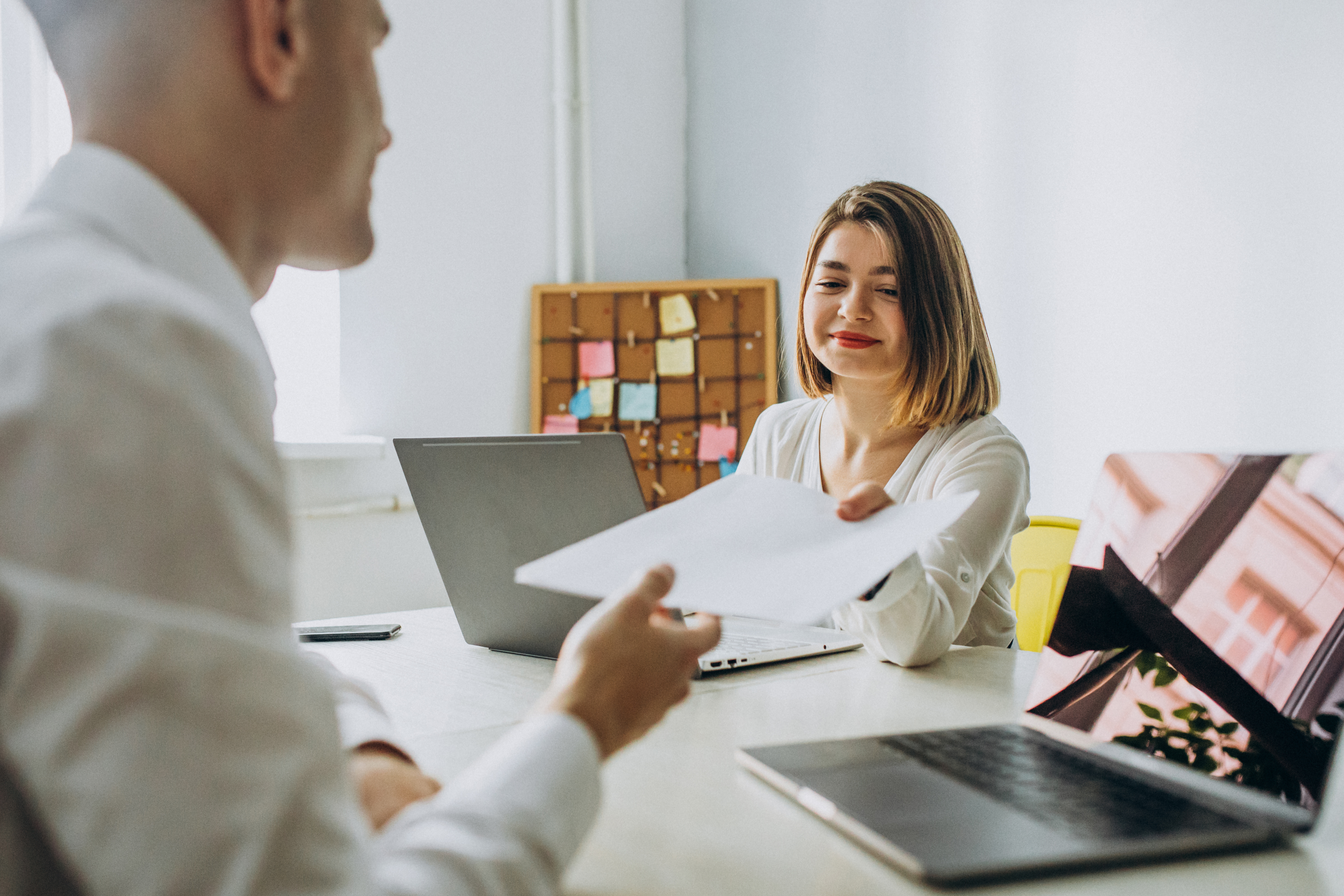female-male-collegues-working-office