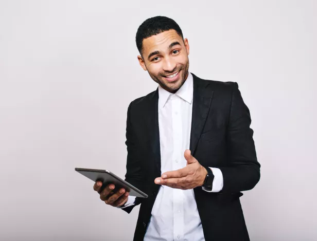 stylish-young-handsome-man-white-shirt-black-jacket-with-tablet-smiling-achieve-success-great-work-expressing-true-positive-emotions-businessman-smart-worker