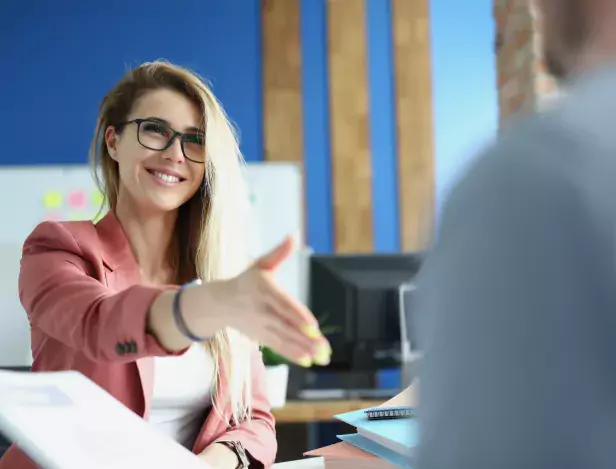 beautiful-woman-suit-happily-greets-man